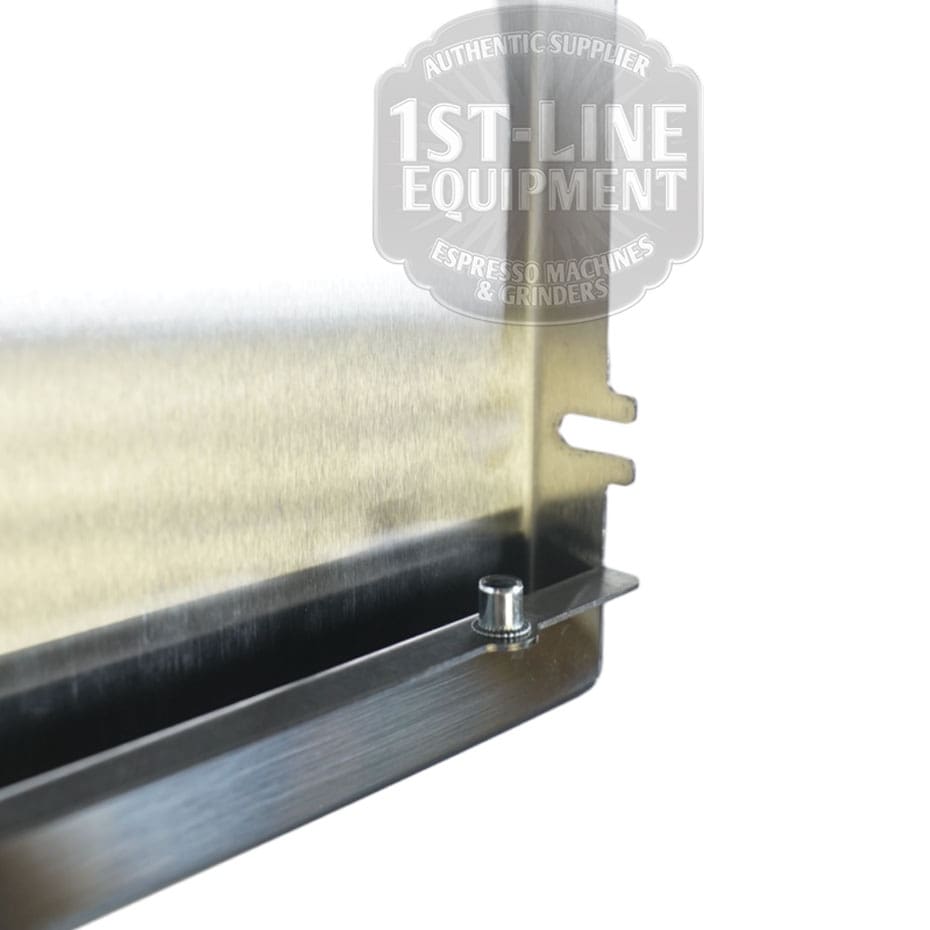 Close-up of the Torre T02POS001 Back Panel - Stainless Steel, showing its metallic edge with a small bolt and mounting slot. The 1st-Line Equipment logo appears blurred in the background. © 2025 1st-line.com