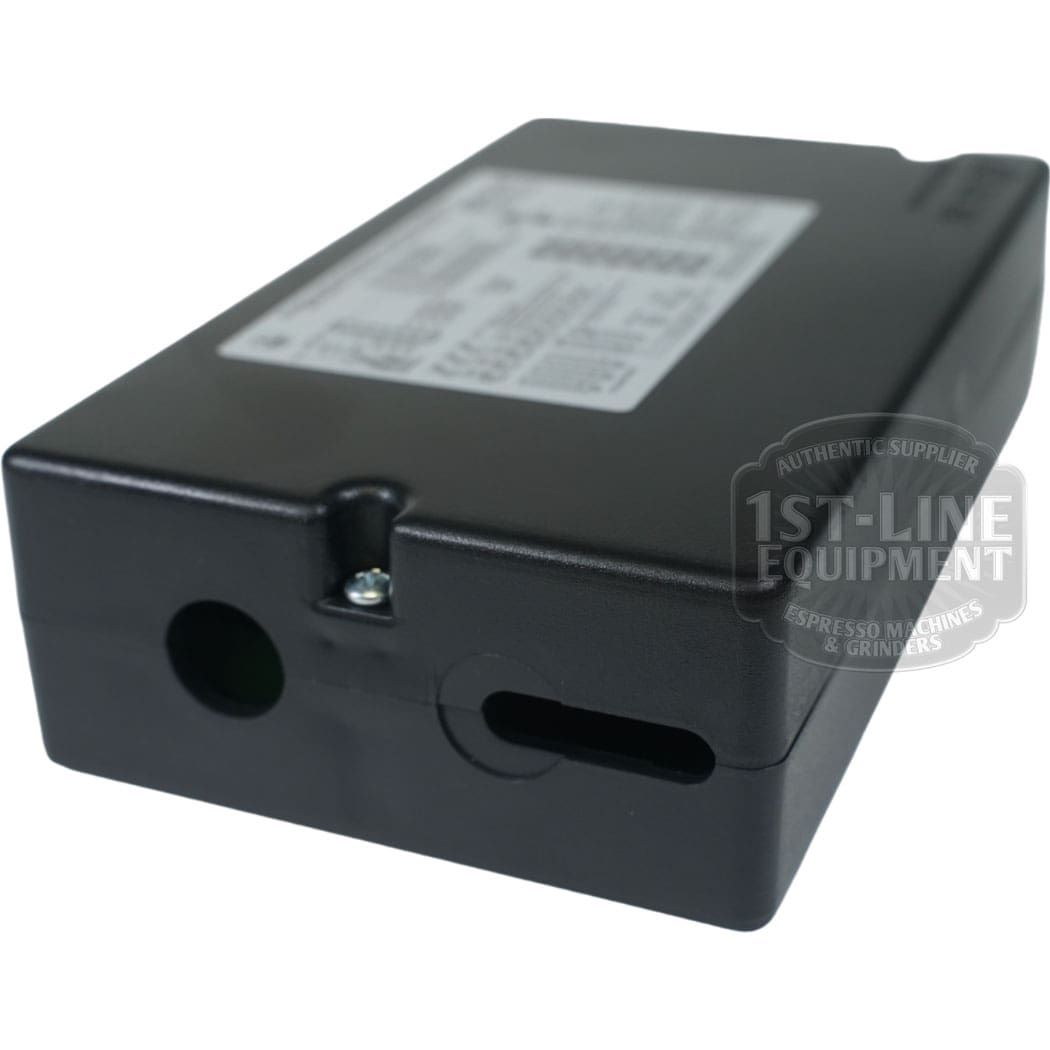 The Torre DOS23001 Control Board, rated for 100-240Vac 50/60Hz, is black and rectangular with a top label showing specs and front circular and oval openings. The 1st-Line Equipment watermark is visible. © 2025 1st-line.com