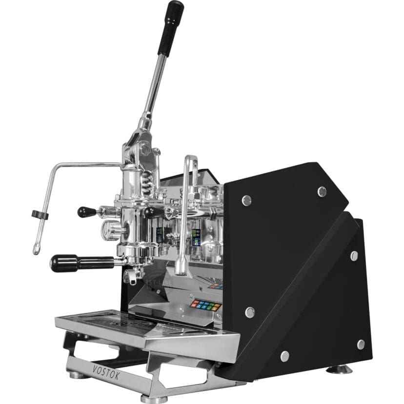A modern, black and silver Vostok Lever Espresso Machine with multiple levers, control knobs, and a cup platform is labeled Vostok on its base and shown against a white background. © 2025 1st-line.com