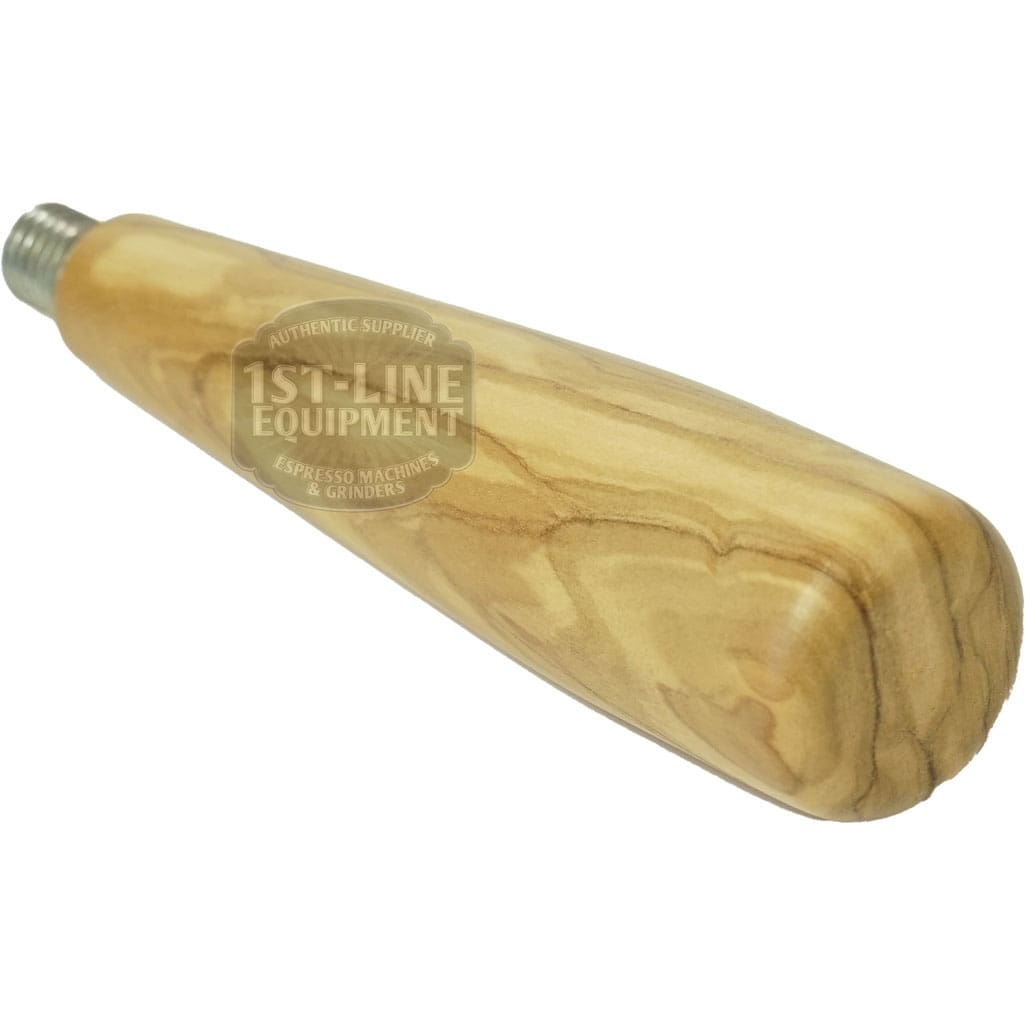 Close-up of the ACS Vostok Handle/Knob Olive Wood Kit, featuring a light brown, olive wood-grain portafilter handle with a metal threaded end. The tapered handle has smooth, rounded edges and is designed for espresso machines. © 2025 1st-line.com