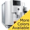 The Jura E8 Super-Automatic Espresso Machine in modern white features a digital display, dual coffee spouts, and comes with a yellow banner stating “More Colors Available.”. © 2025 1st-line.com