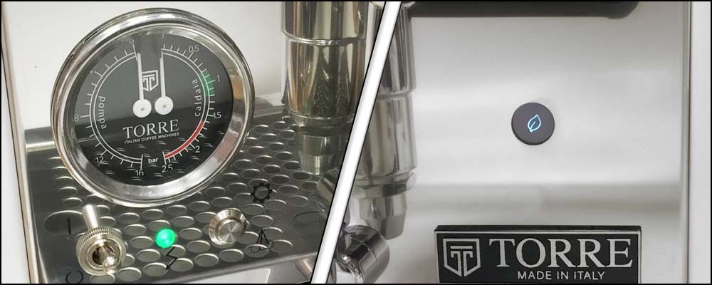 Close-up of the Torre Alfredo TSP HX Espresso Machine featuring a pressure gauge, perforated metal surface, green indicator light, and a separate round power button above the TORRE logo and MADE IN ITALY label. © 2025 1st-line.com