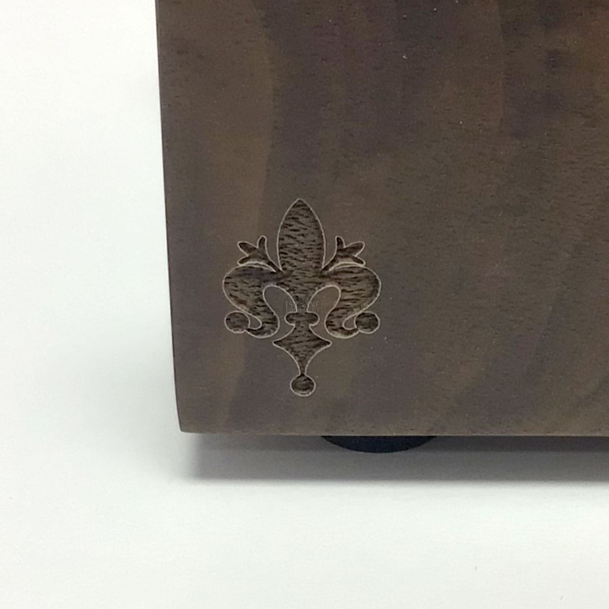 The Eureka Walnut Tamping Station - double housing features an engraved fleur-de-lis near the bottom corner, displayed on a white background. © 2025 1st-line.com