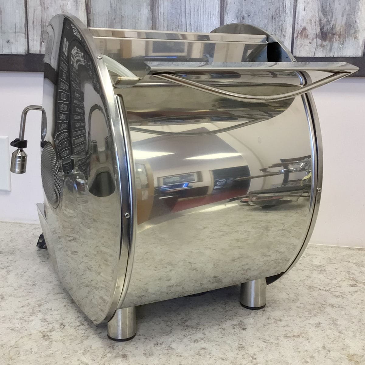 A gleaming Isomac Mondiale HX Espresso Machine (E013) sits on the countertop, its stainless steel reflecting the surroundings—a highlight of the SIDEWALK SALE. © 2025 1st-line.com