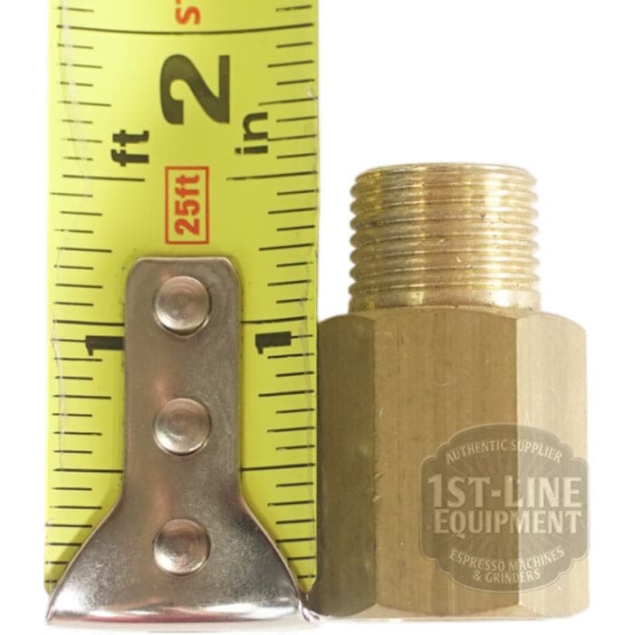 The V..319A 3/8F-3/8M Extended Fitting is a brass hexagonal fitting with male threads, shown next to a measuring tape for scale (approx. 1.5 high) and branded by 1st-Line Equipment. © 2025 1st-line.com