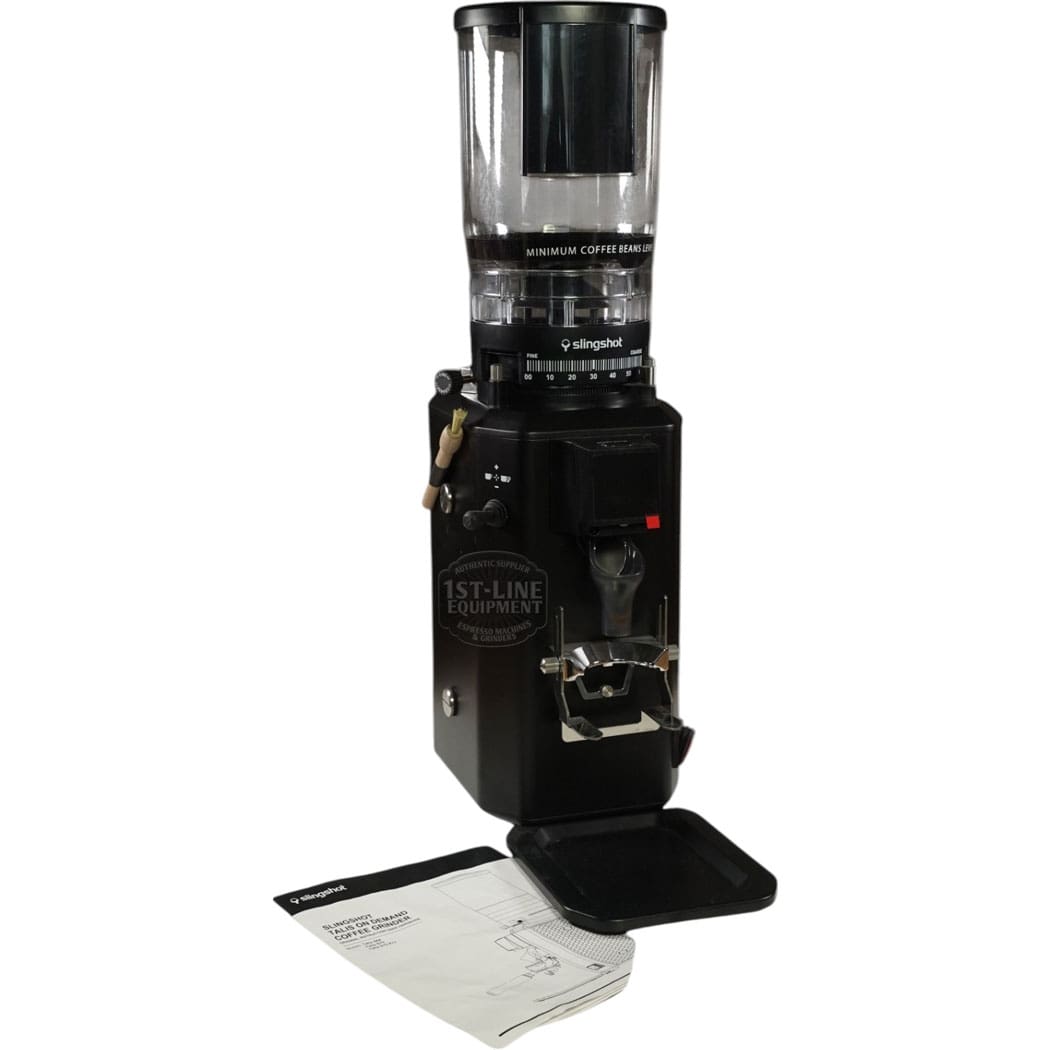 A CONVENTION DEMO - Slingshot Talis S75 Espresso Coffee Grinder Black 220V (C203) with a transparent bean hopper, black tray, and two instruction manuals is displayed on a white background. © 2025 1st-line.com