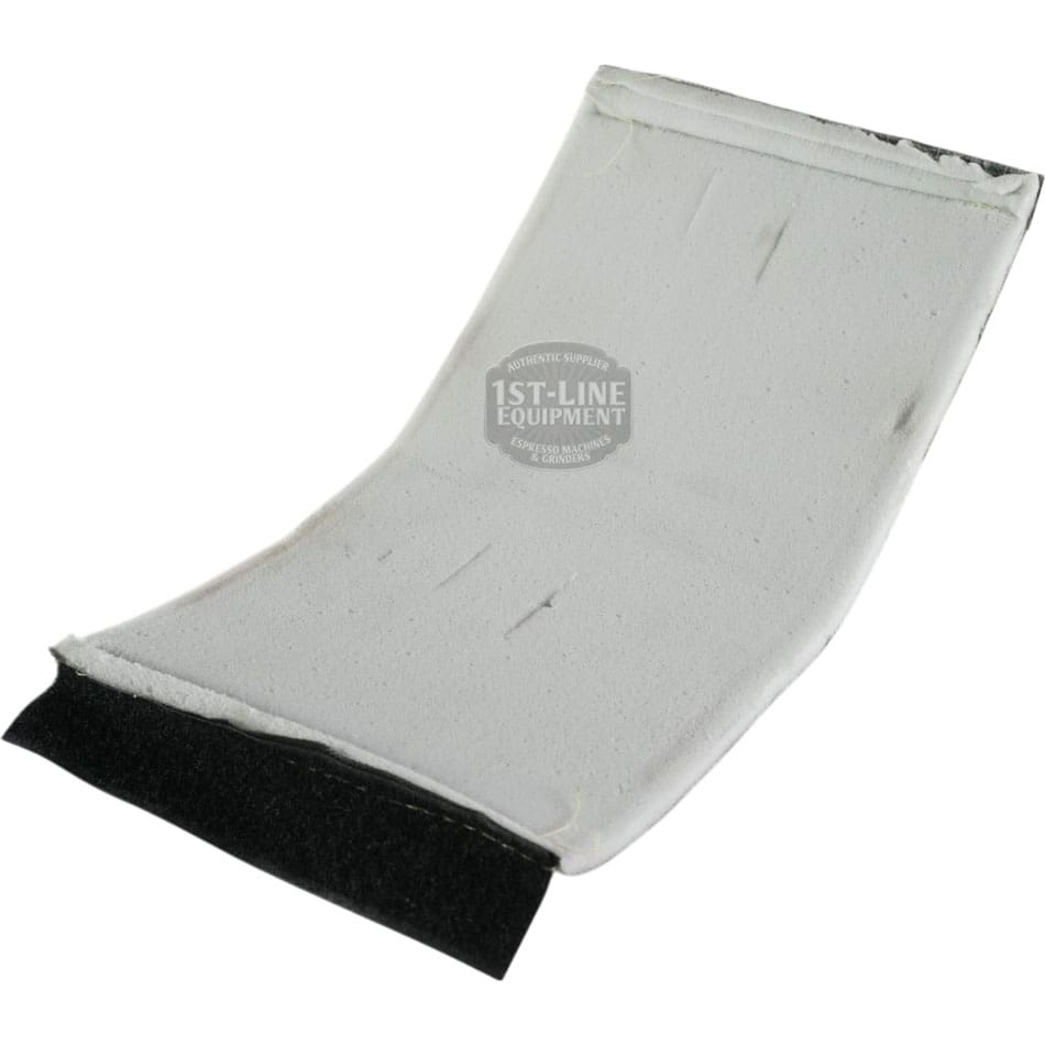 A rectangular, flexible white foam pad with black insulation on one edge, slightly curved and creased, shown against a white background. Compatible with Lelit 8300005 Thermal Insulation for Elizabeth Steam Boiler (Used). © 2025 1st-line.com