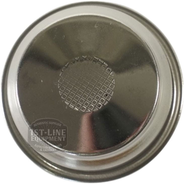 A top view of the Lelit 1600071 Pressurized Filter 58mm shows its metal basket with a center perforated grid, reflective surface, and 1st-Line Equipment watermark on the lower left. © 2025 1st-line.com