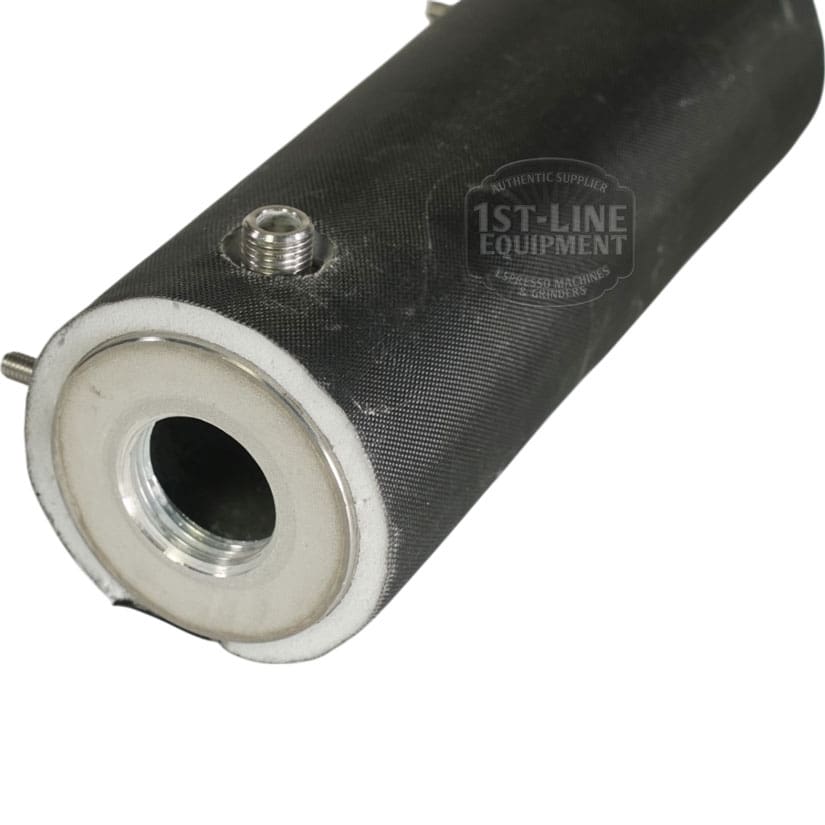 Close-up of a USED Lelit 1000165 Coffee Boiler Assembly, a black cylindrical metal part with a threaded port and circular opening, designed for Lelit espresso machines. The faint 1st-Line Equipment logo is visible on the cylinder. © 2025 1st-line.com