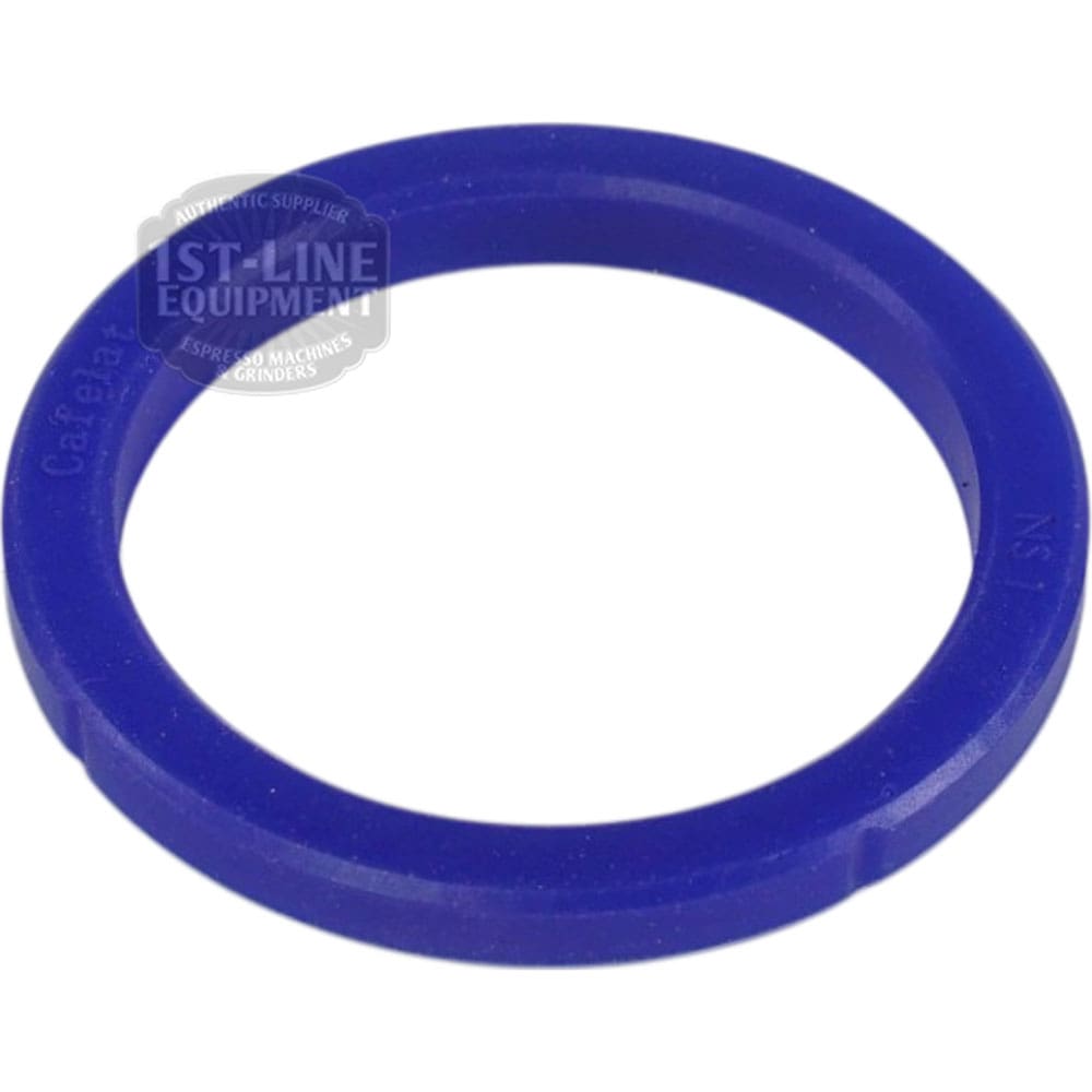 The Cafelat NS 1 Blue Silicone Portafilter Gasket for Nuova Simonelli (71x56.5x9mm) has a smooth surface with a slight ridge. Shown on a white background, the 1st-Line Equipment watermark appears faintly in the upper left corner. © 2025 1st-line.com