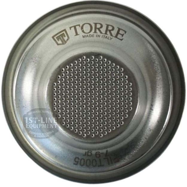 The Torre FILT0005 1-cup Filter Basket is a metal espresso machine filter marked TORRE MADE IN ITALY, featuring many small center holes and the code TORRE FILT0005 (110005) along its edge. © 2025 1st-line.com