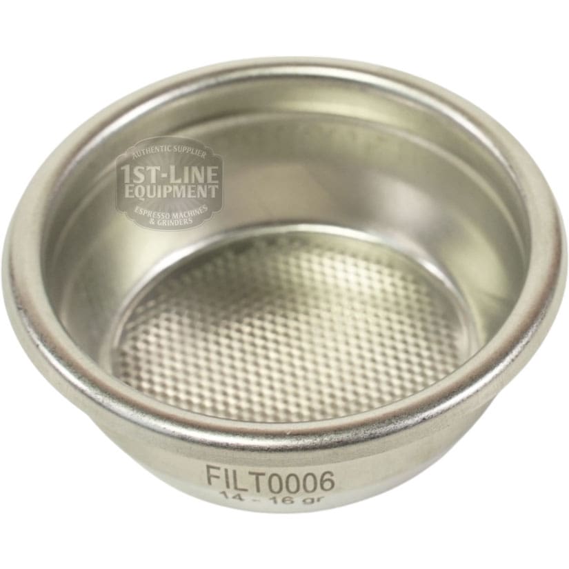 The Torre FILT0006 2-cup filter basket, made of stainless steel with fine mesh holes and FILT0006 14-16 gr engraved on the side, features a 1st-Line Equipment watermark and is perfect for Torre espresso machines. © 2025 1st-line.com