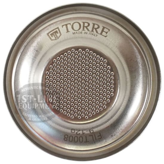 The Torre FILT0008 Peppina Premium Pack 1-cup Filter Basket is metal with a brushed, reflective finish, small center holes, and engraving: TORRE Made in Italy FLT008 9-12g—showcasing quality for your Peppina espresso machine. © 2025 1st-line.com