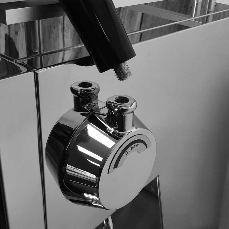 Close-up of a shiny, chrome steam fixture on a Bellezza Bellona appliance, with a disconnected black pipe above two circular openings, reflecting its surroundings in a monochrome setting—the right fit for modern elegance. © 2025 1st-line.com