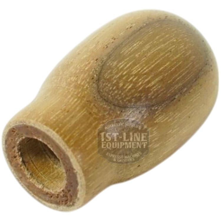 The Torre MANP0010LW Light Wood Flow Control Handle is a small, cylindrical handle with visible wood grain, a smooth finish, and a hollow center. Shown on a white background, it appears slightly tapered at one end. © 2025 1st-line.com