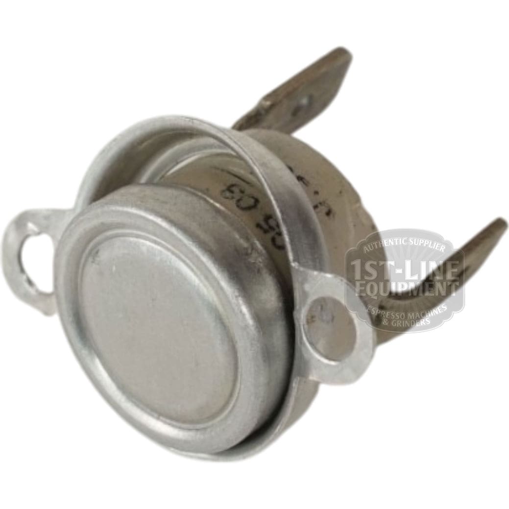 A close-up of the Thermostat 165 Degree C, featuring two flat prongs and mounting holes, commonly used in small appliances or machinery for high temperature control. © 2025 1st-line.com