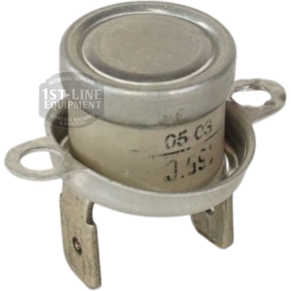 A close-up of the Thermostat 165 Degree C, featuring two legs and mounting holes with a 1st Line Equipment watermark. This device is commonly used for temperature control in espresso machines and similar appliances. © 2025 1st-line.com
