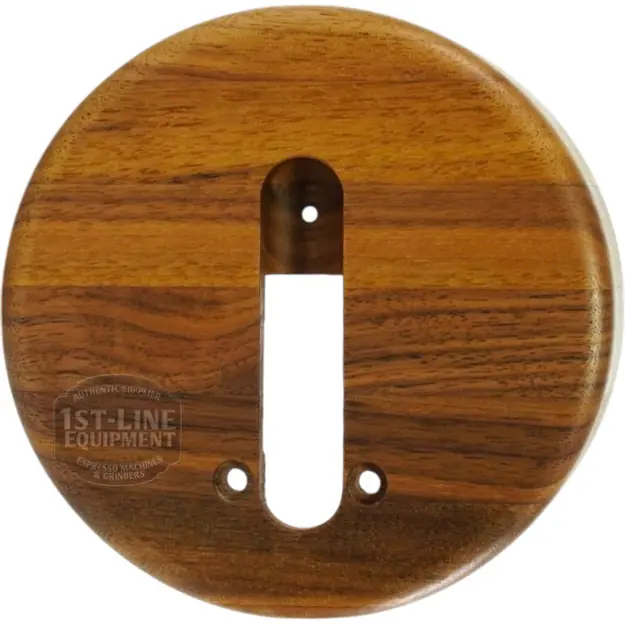 The Rocket M099906743 Epica Grouphead Wood Cover is a round wooden plate with a warm brown finish, featuring visible grain patterns, a vertical keyhole-shaped slot, and two smaller holes—ideal for Rocket Epica machines. © 2025 1st-line.com