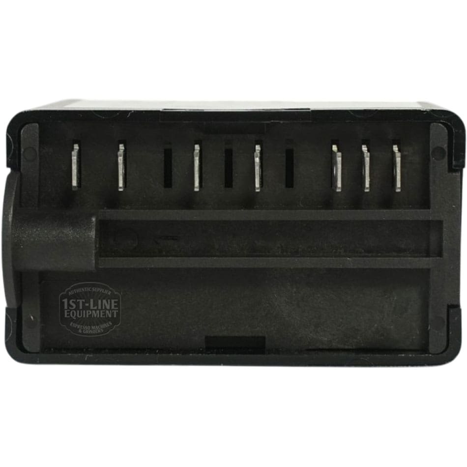 A close-up of a black rectangular plastic connector with six metal pins, as seen on the Gicar Brain Unit - 9.1.40.70G, 115V (Magister 180029), shown from the end where the pins are visible. © 2025 1st-line.com