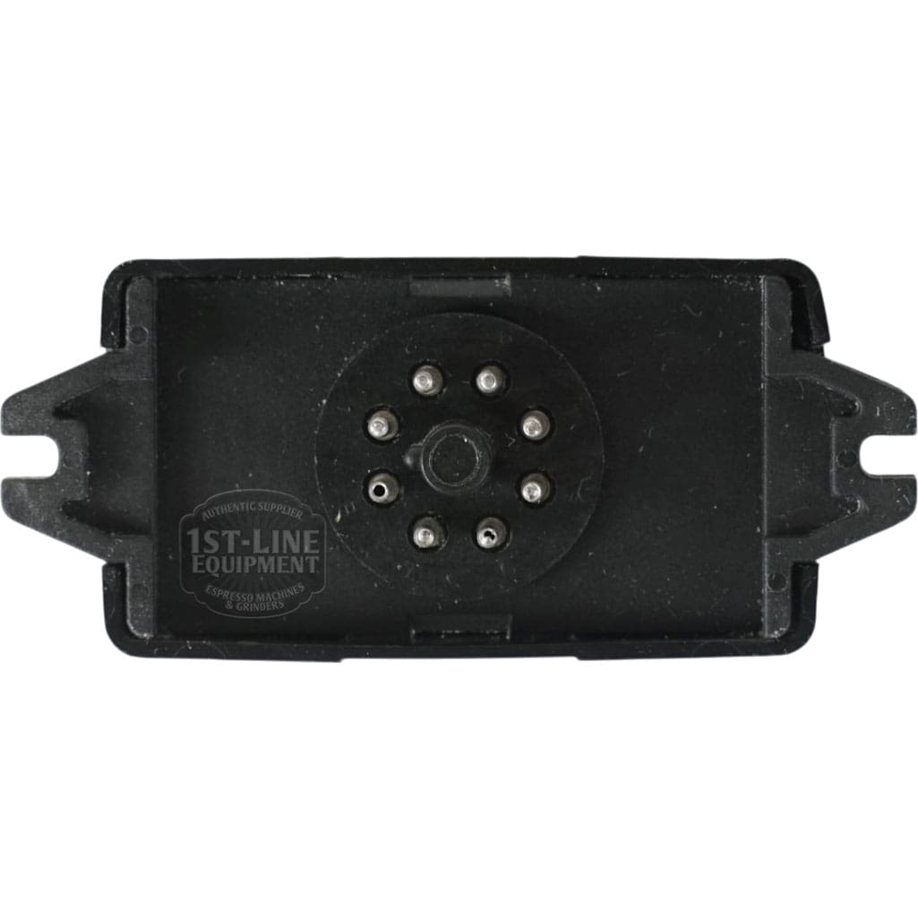 Black rectangular electronic component labeled 1st-Line Equipment with 9 central metal pins and 2 mounting tabs; serves as the Gicar RL30/1E/8 9.1.00.00 Water Level Regulator for 220V systems. © 2025 1st-line.com