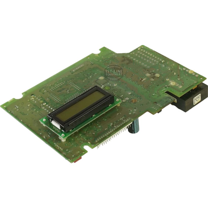 A Bunn 29969.0000 Main Control Circuit Board with a small rectangular digital display and various components, viewed at an angle against a white background. © 2025 1st-line.com