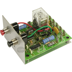 A close-up of the American Metal Ware 530-007 Solid State Brew Timer shows resistors, capacitors, a relay, connectors, and wiring mounted on a green PCB with a metal base plate. © 2025 1st-line.com