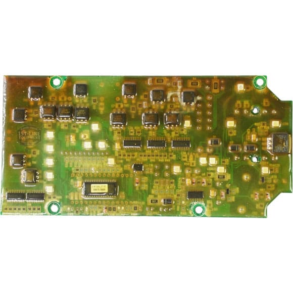 A close-up view of a green printed circuit board (PCB) with electronic components such as chips, resistors, and connectors—designed for devices like the Bunn 28975-1000 Display Assembly. © 2025 1st-line.com
