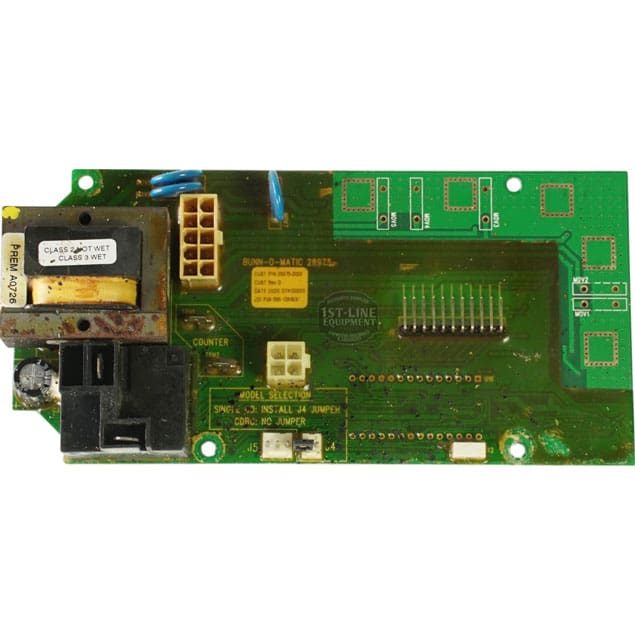A green circuit board with connectors, a transformer, and chips labeled BUNN-O-MATIC 29215 is comparable to the Bunn 28975-1000 Display Assembly. © 2025 1st-line.com