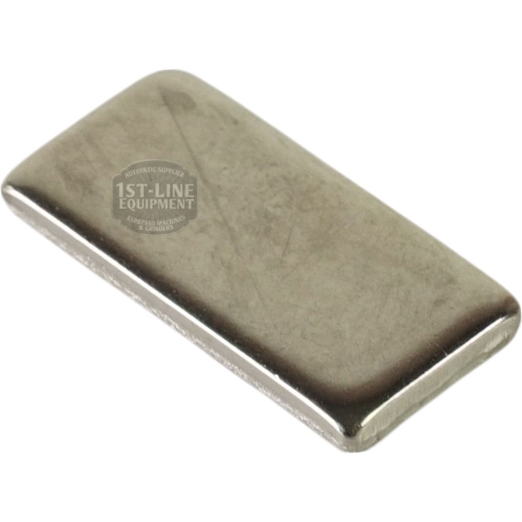 A rectangular, flat metal object with rounded edges and a smooth, reflective surface appears against a white background. The faint logo and text identify it as the Bunn 05852.0001 Shear Plate .562x1.16x.120 coffee machine part. © 2025 1st-line.com