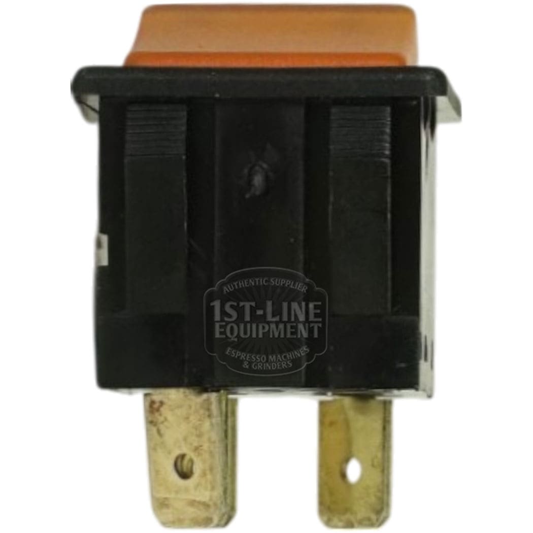Close-up of a black and orange Curtis WC-124 Amber Rocker Hot Water Switch with two brass terminals, designed for espresso machines; the 1st-Line Equipment logo appears faintly on the front. © 2025 1st-line.com