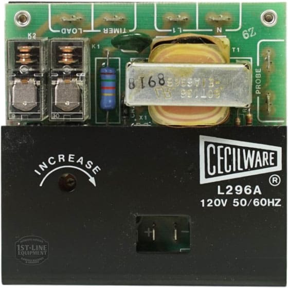 Close-up of Cecilware L296A Liquid Level Control LCW-S1399-120 electronic component, showing a green and black unit with visible circuit board, labeled buttons, transformer, ports, and 120V 50/60Hz marked on the front panel. © 2025 1st-line.com
