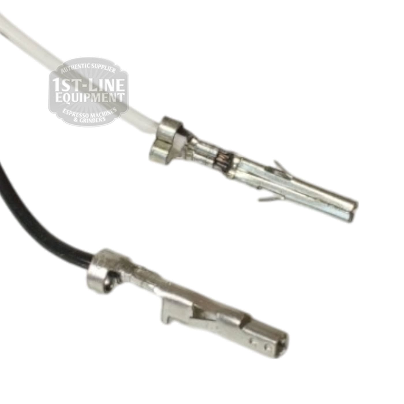 Close-up of two metal wire connectors on black and white wires, part of the Bunn 29327.0000 Temperature Probe Sensor, 7.5, displayed on a white background with the partially visible 1st-Line Equipment logo in the top left corner. © 2025 1st-line.com