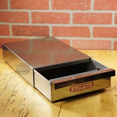 The SIDEWALK SALE Elektra BF Commercial Knock Out Box Drawer/Base (E208) rests on a wooden surface before a brick wall, its perforated front section partially open—ideal for your next sidewalk sale display. © 2025 1st-line.com