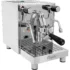 A stainless steel Magister espresso machine with dual wands, pressure gauges, digital display, and a portafilter, set on a reflective drip tray. © 2025 1st-line.com