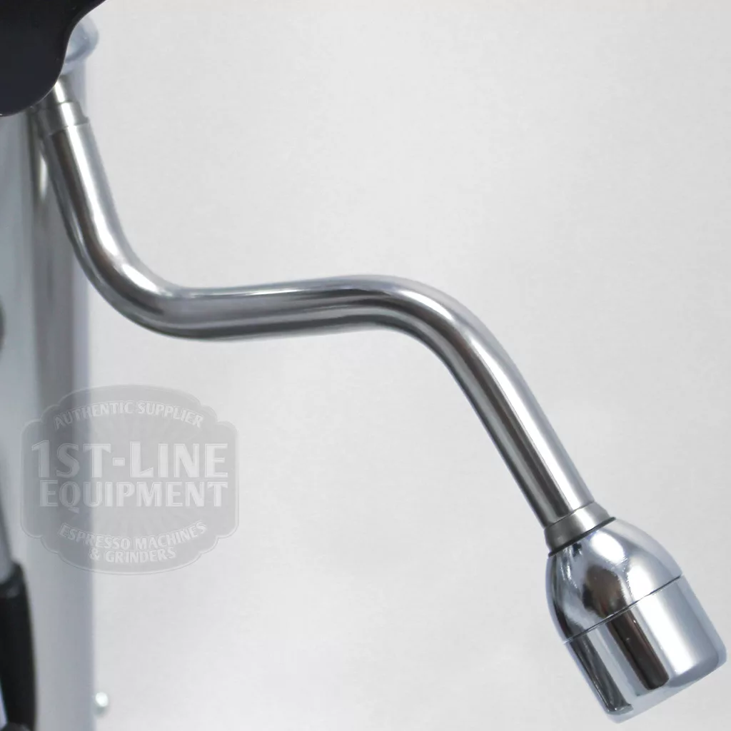 A close-up of a metallic steam wand attached to an espresso machine, with a curved nozzle at the end. The background is blurred, and a 1st-Line Equipment watermark is visible. © 2025 1st-line.com