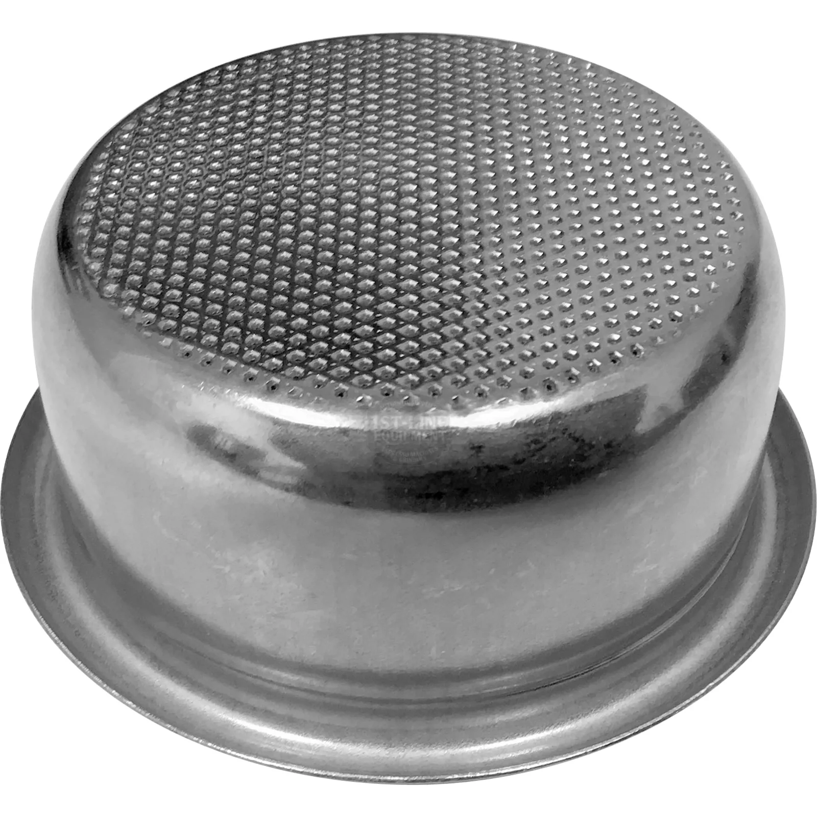 A large, round, metal baking pan turned upside down, showing a textured, dimpled bottom surface. The pan appears silver and has a raised rim around the edge. © 2025 1st-line.com