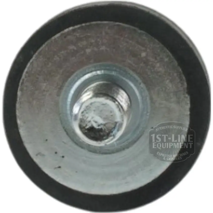 Close-up view of a round metal washer with a central bolt and a black rubber ring around the edge, photographed from above on a white background. © 2025 1st-line.com