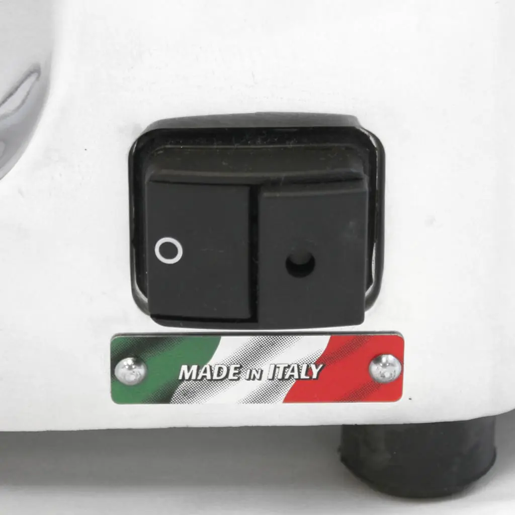 Close-up of a black power switch on a white Quamar Q50 coffee grinder. Below the switch is a label featuring the Italian flag colors and text reading MADE IN ITALY.