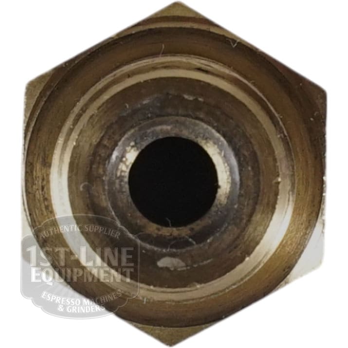 Close-up of the VBM RACCP867 Fitting for Brass Wand Articulated Joint, featuring a hexagonal brass body with a central hole and visible threads—ideal for use in espresso machines or grinders due to its durable metallic texture.