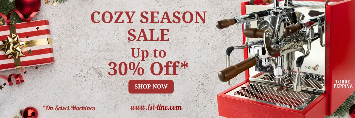 A festive holiday sale banner with a red espresso machine, gift boxes, and ornaments highlights cozy season deals. Text reads “COZY SEASON SALE Up to 30% Off* Shop Now.” Small text: “On select machines,” with www.1st-line.com.