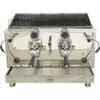 The VBM Lollo 2 Group Espresso Machine - 240V features dual steam wands, a drip tray, and the VBM logo on its stainless steel body, providing professional performance for commercial use.