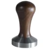 The Torre TAMP0003 58mm Tamper features a wooden handle and stainless steel base, standing upright on a white background to blend style and function for perfect espresso preparation.